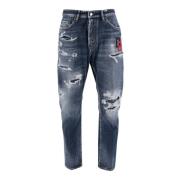 Jeans i denim med slidt effekt