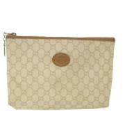 Pre-owned Canvas clutches