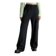 Sorte bukser med lynlås og lommer