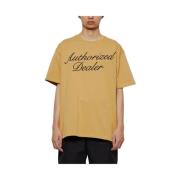 Beige T-shirt med sort broderi