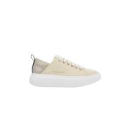 Sporty og Elegant Sand Guld Sneakers