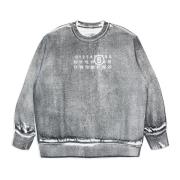 Sweatshirt med falmet effekt print