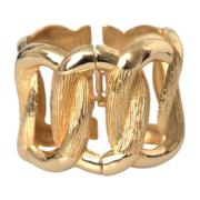 Guld Twisted Loop Bangle Armbånd