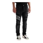 Distressed Skinny Jeans med Varsity Logo