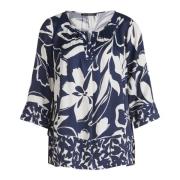 Blomstret slipbluse med feminint charme