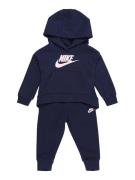 Nike Sportswear Joggingdragt  mørkeblå / lyserød