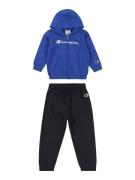 Champion Authentic Athletic Apparel Joggingdragt  marin / royalblå / r...