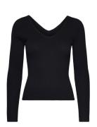 Ribbed Sweater With Low-Cut Back Mango Black