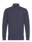 Cloud Quarter Zip 2. Travis Mathew Navy