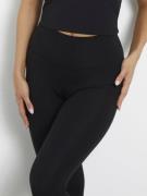 GUESS Marika Mini Flare Leggings Kvinde Jet Black A996 Leggings Str L ...