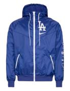 Los Angeles Dodgers Men's Nike Team Runner Windrunner Jacket Outerwear...