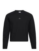 M. Hanger Crop Longsleeve Designers T-Langærmet Skjorte Black HOLZWEIL...