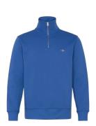 Reg Shield Half Zip Sweat Tops Sweatshirts & Hoodies Sweatshirts Blue ...