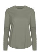 Team Logo Long Sleeve Sport T-shirts & Tops Long-sleeved Green Röhnisc...