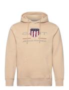 Reg Archive Shield Hoodie Tops Sweatshirts & Hoodies Hoodies Beige GAN...