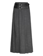 Cmtonnie-Skirt Is A Long Trucker-Style Skirt With Wide Pleats, A Conce...