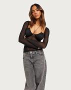 Nelly - Sort - Stunning Detail Mesh Top